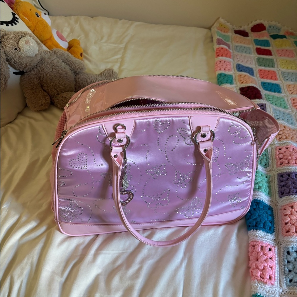 Pink butterfly dog carrier